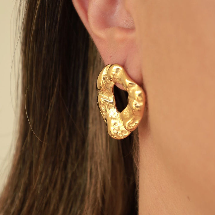 Irregular textured gold earrings